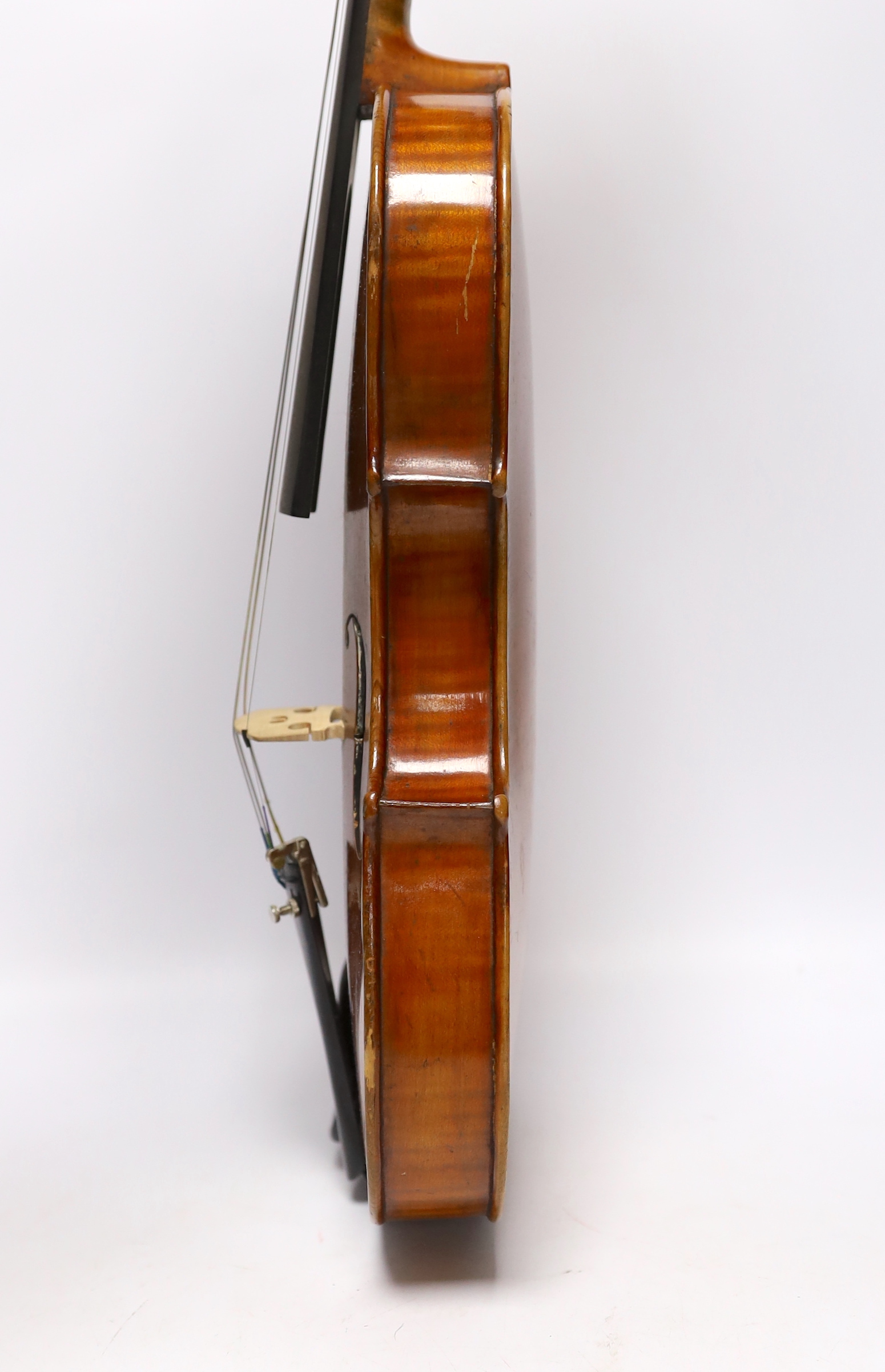 A cased early 20th century French violin, bears Strad label